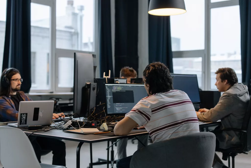 AI software development services team designing machine learning and data workflows